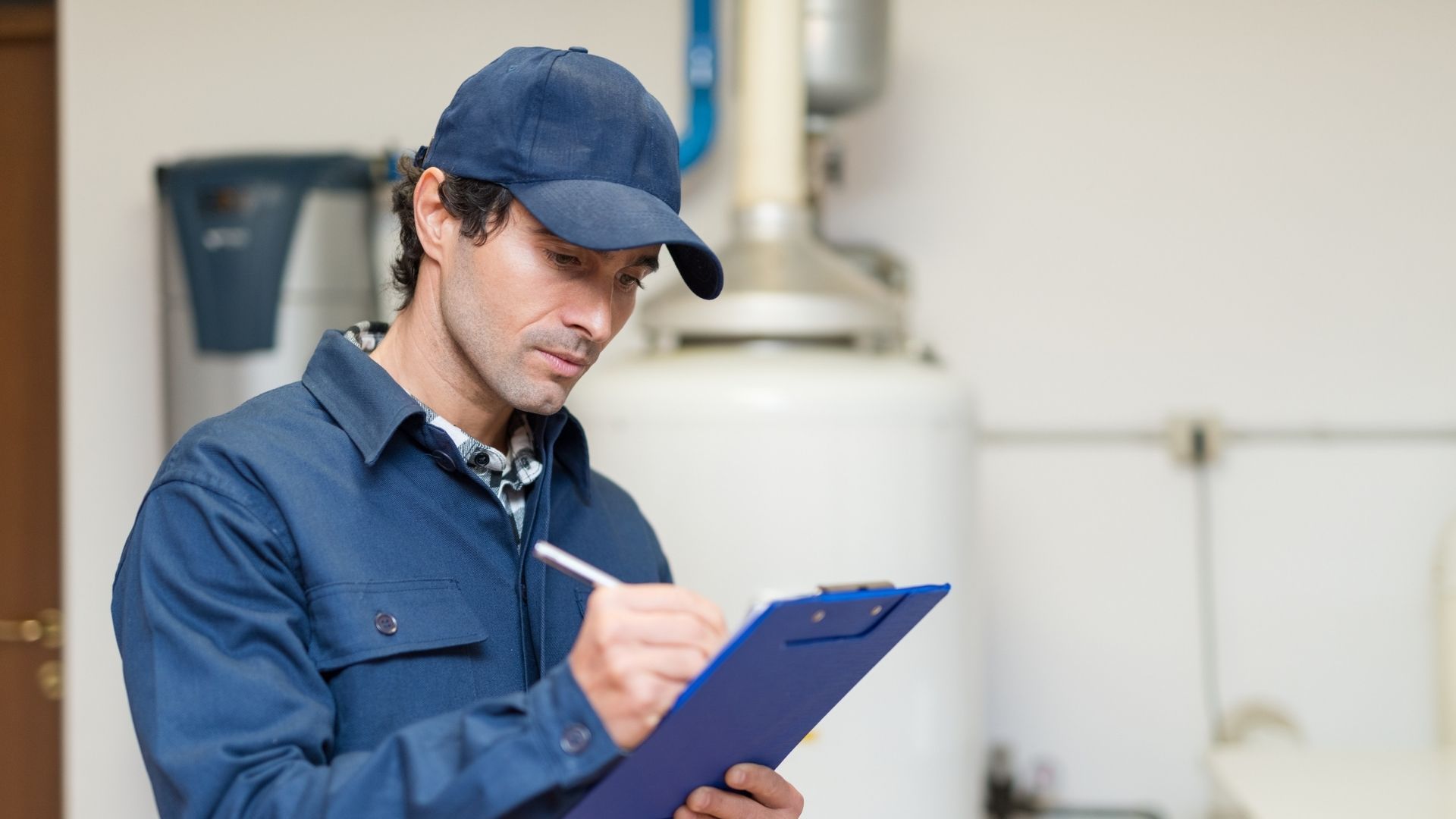 HVAC tech with clipboard