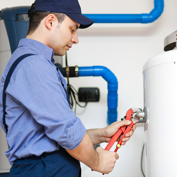 plumber working on a water heater