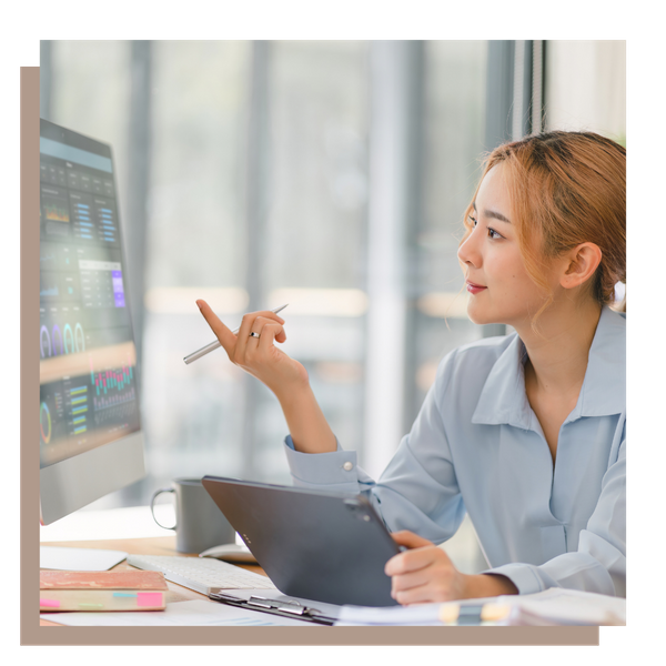 Woman analyzing data on a computer