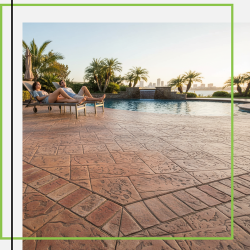 Golden hour shot of a luxurious backyard with a couple relaxing on lounge chairs by a swimming pool, overlooking a vibrant, textured stamped concrete patio designed to mimic rustic tilework.