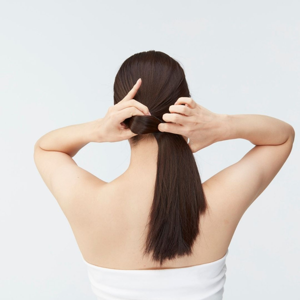 Woman doing her hair