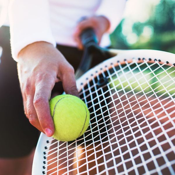 Tennis ball and raquet 