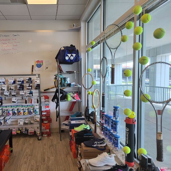 Tennis String Theory retail store interior