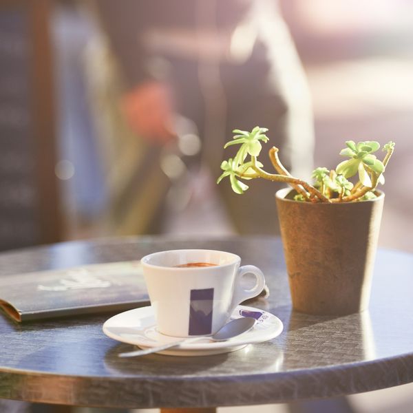 Outside table with a cup of coffee