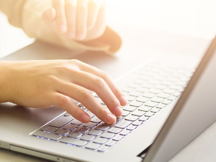 Person working on their laptop.