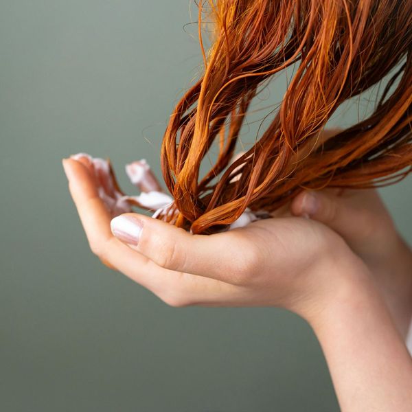A woman washing her hair.