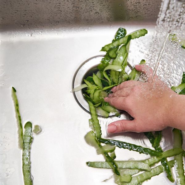 putting vegetables down a disposal