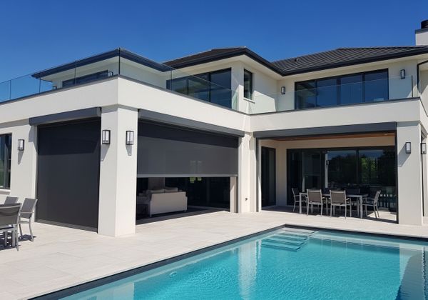 Modern House with Outdoor Shades and Pool