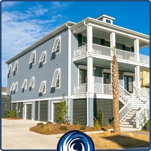 A large multi-story coastal home featuring a combination of white Bahama shutters on the upper windows and roll-down shutters on the porch for maximum storm protection.
