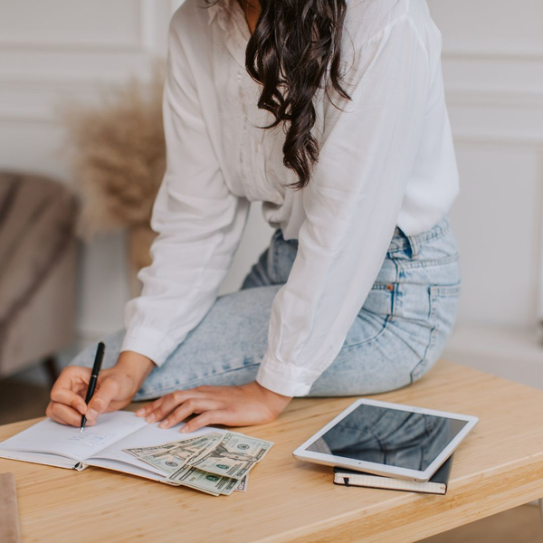 Woman creating a business plan. Woman creating a business plan.