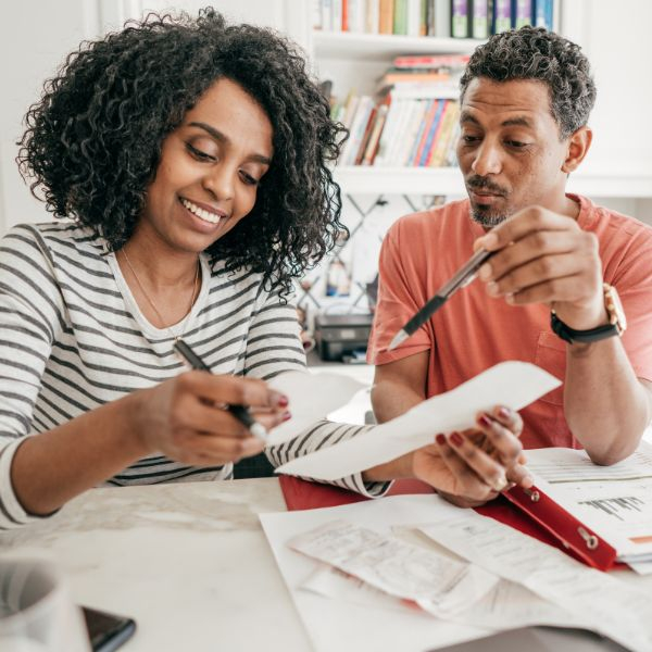 Couple looking over their taxes