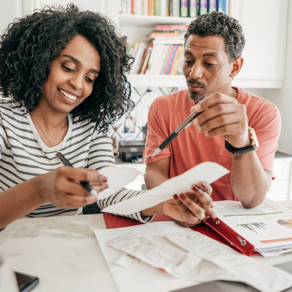 couple looking at taxes