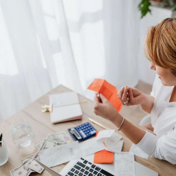 Woman going through multiple receipts