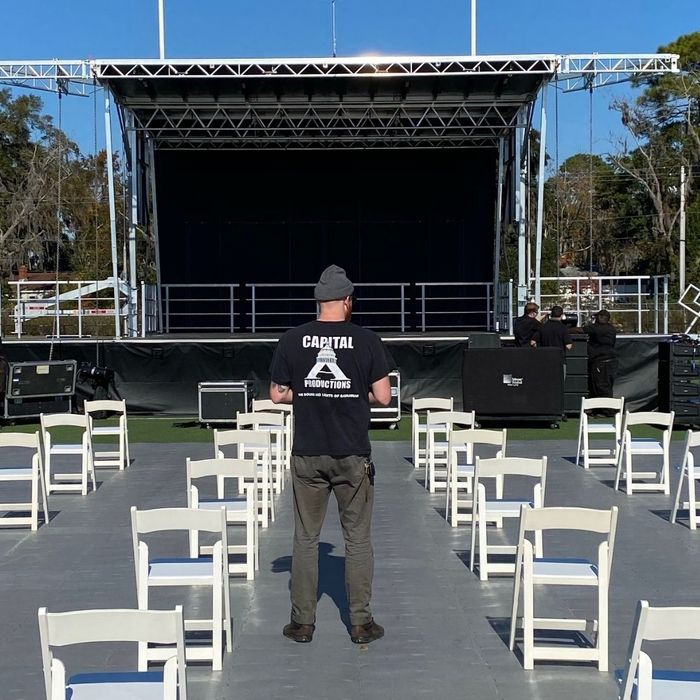 man in front of stage