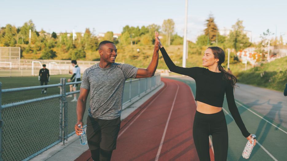 man and woman after a workout