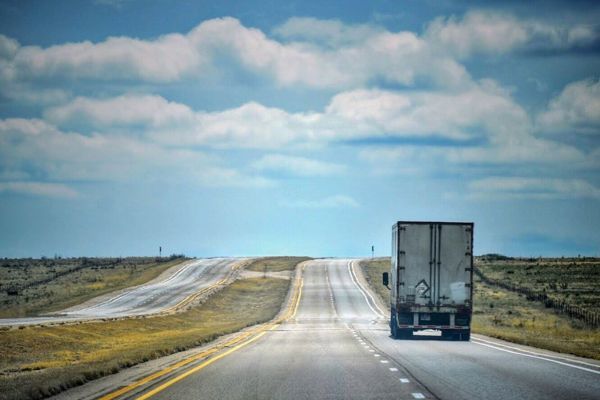 moving truck driving on road