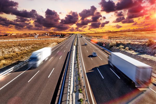 moving trucks driving on road