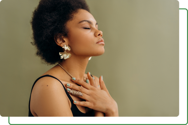 Woman holding her chest