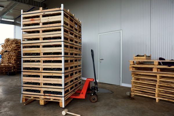 pallet jack with wooden pallets