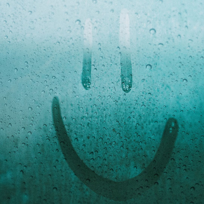 smiley face on window condensation