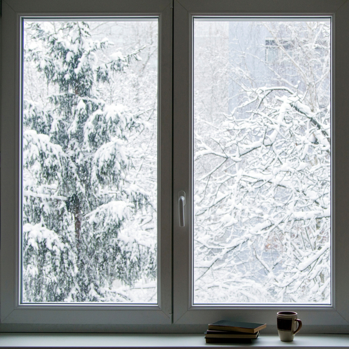 Winter scene through a warm, cozy window Winter scene through a warm, cozy window