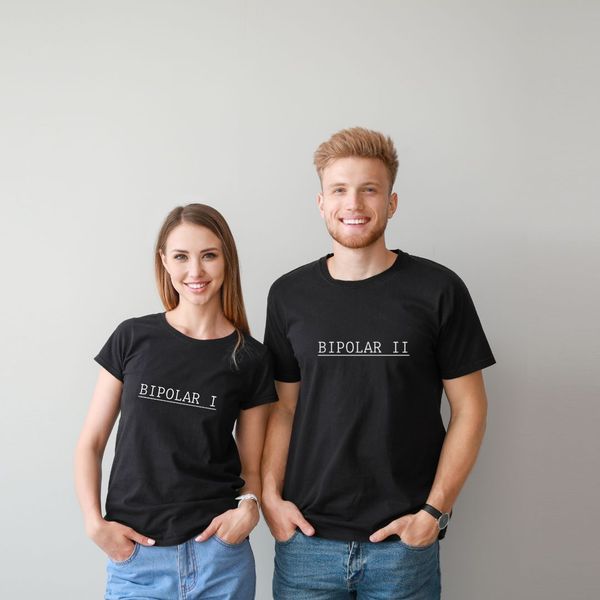 Couple wearing "Bipolar 1" and "Bipolar 2" Shirts