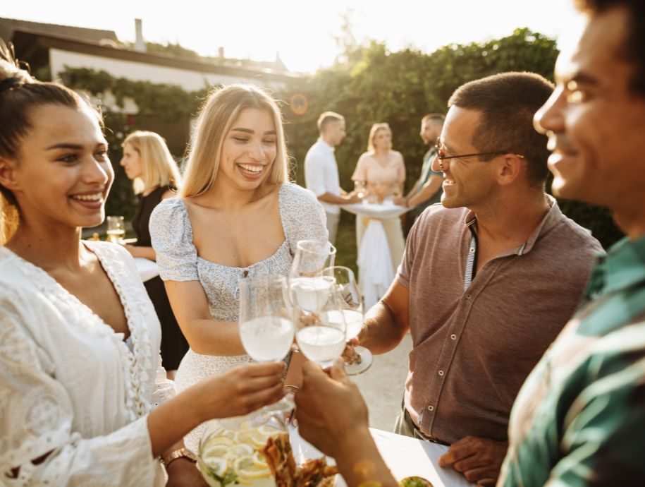 A group of people enjoying a garden party