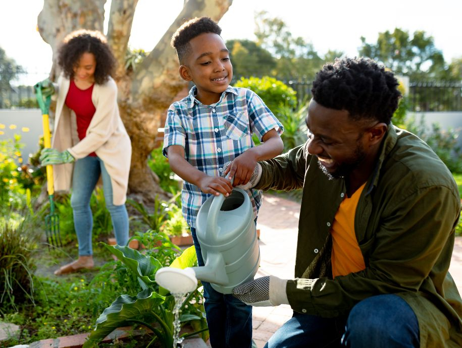 A happy family working in the garden together