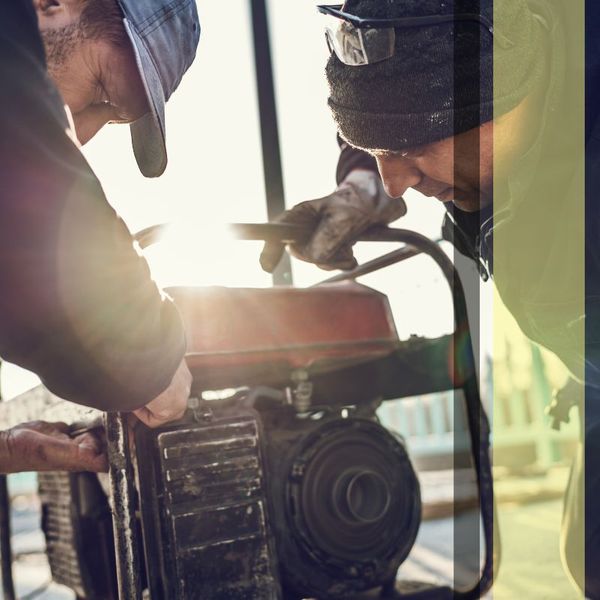 electricians working on generator