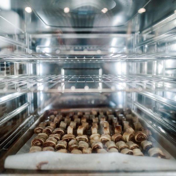 An oven filled with pastries.