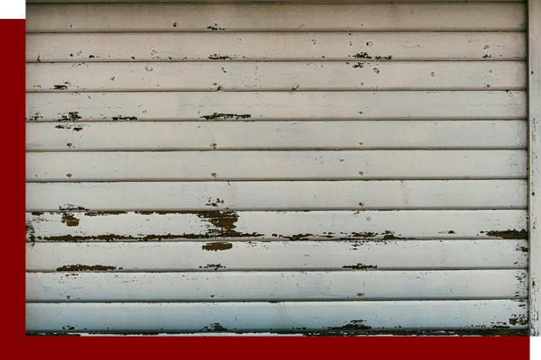 image of a weathered garage door