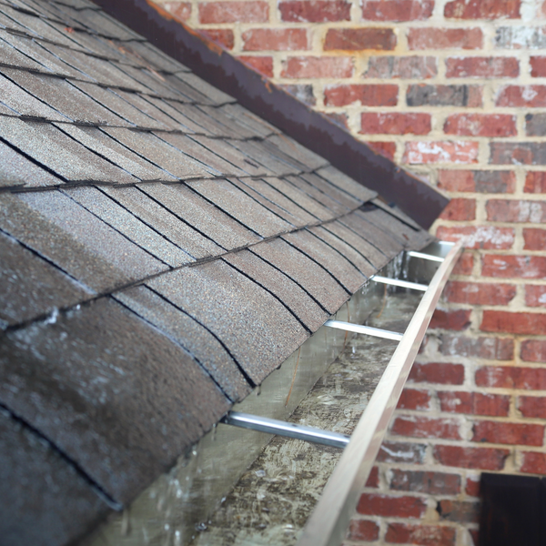 Rain runoff from roof into seamless gutters