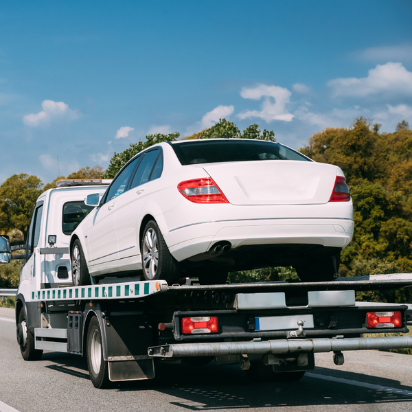 car on a tow truck. 