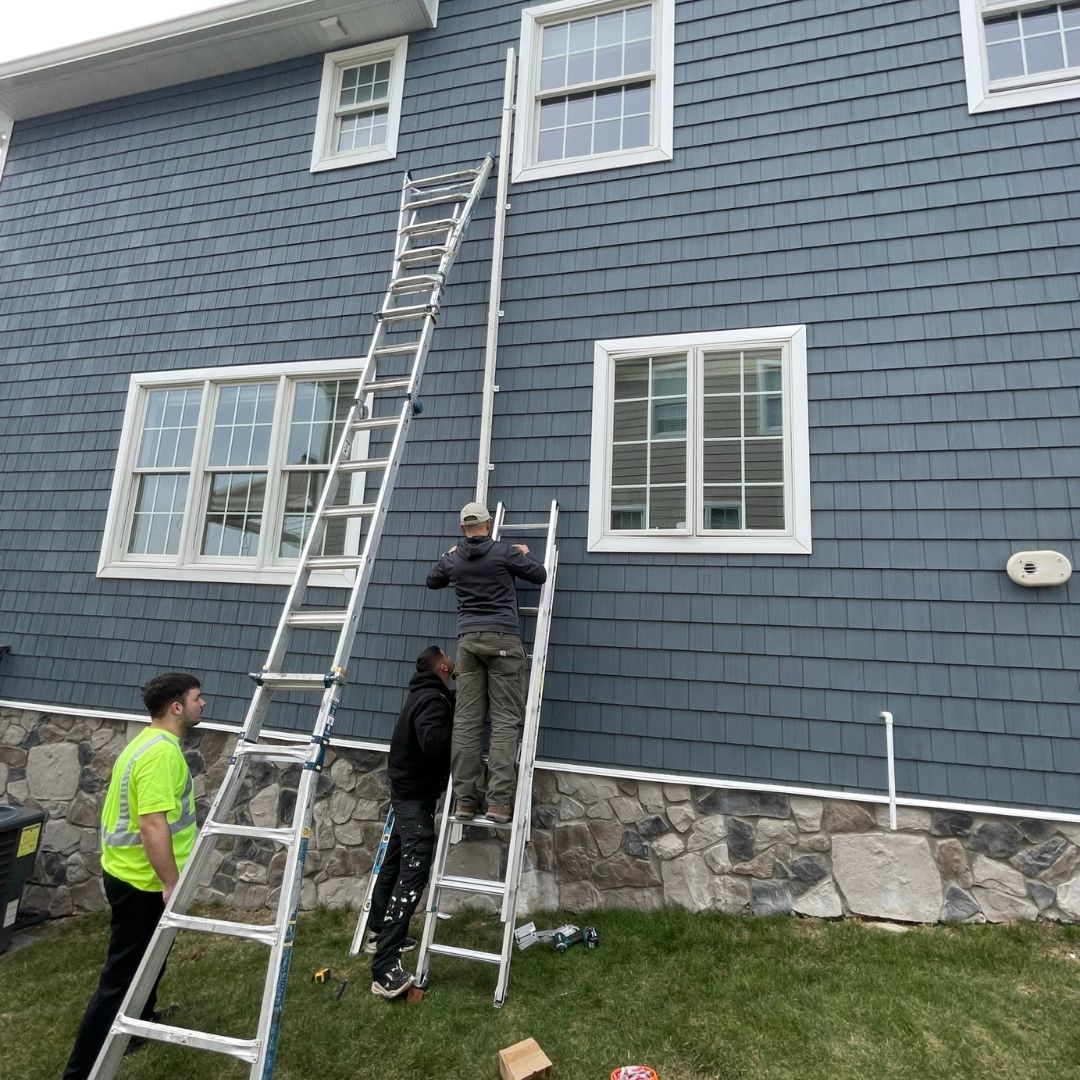 image of a fire escape ladder being installed