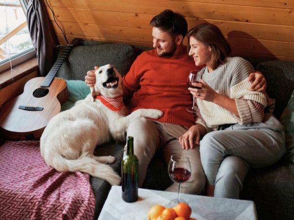 family and their dog in their home