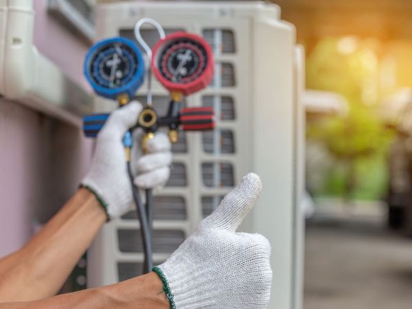 Using a pressure meter giving a thumbs up