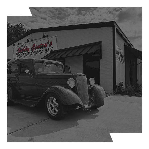 A classic car in front of Bobby Gentry's