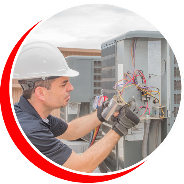 technician working on HVAC unit technician working on HVAC unit