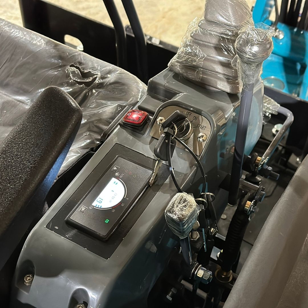 interior of Kymron mini excavator