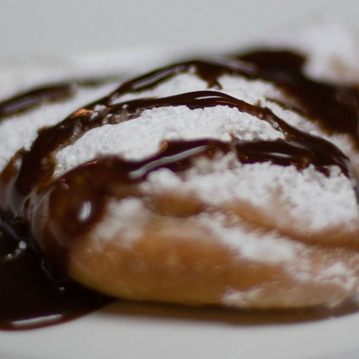 Beignets with sugar and chocolate on top
