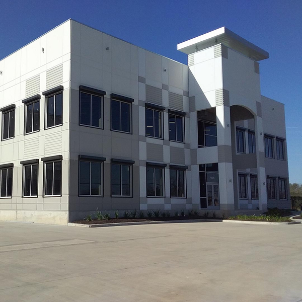Commercial building with roll-down security shutters