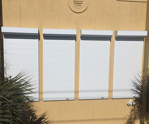 Controlled electronically with an attached gearbox that allows for manual operation
 Automatic/Manual Rolling Shutters