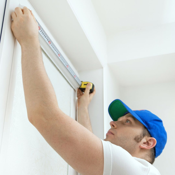 Person installing shutters