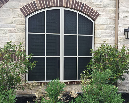 Tapco Security Screens offer next-level security and protection. Combining a high-strength steel mesh screen and a durable aluminum frame, a Tapco Screen creates a barrier that is virtually impenetrable. These high-impact window screens offer an economical, versatile, and highly effective solution when it comes to hurricane window protection. Windows and sliding doors will be protected from flying debris and other potential hazards during severe storms. They also can offer protection against break-ins or forced entry. Additionally, the security screen’s clean lines and unobtrusive design integrates nicely with all architectural styles. Tapco Screens