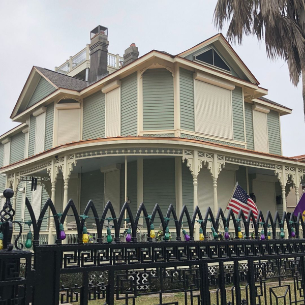 Hurricane shutters on a New Orleans style home