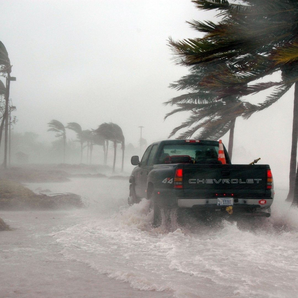 A truck driving during a hurricane flood A truck driving during a hurricane flood