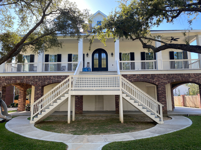 Houston Home with Colonial Hurricane Shutters Houston Home with Colonial Hurricane Shutters