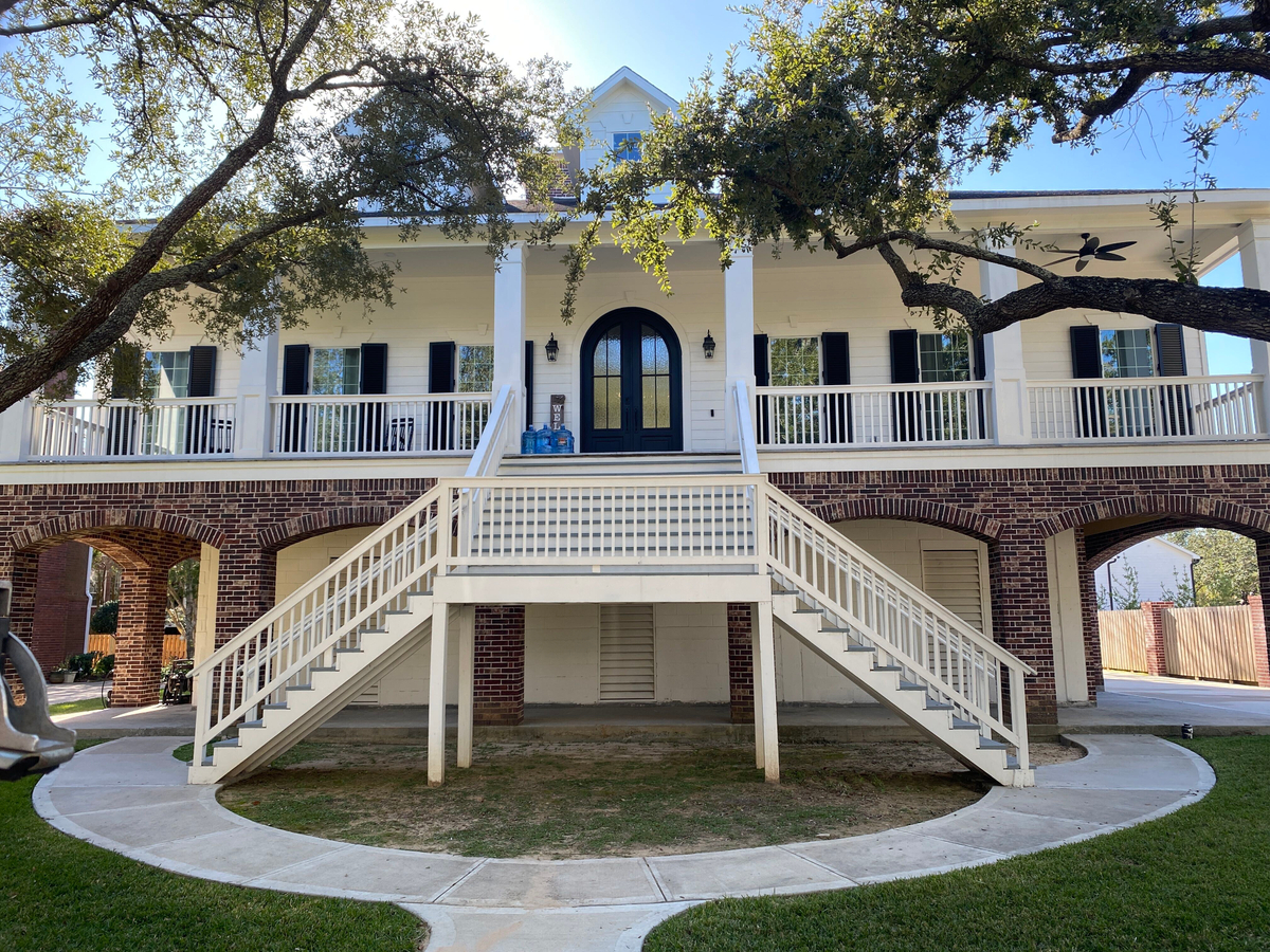 Houston Home with Colonial Hurricane Shutters