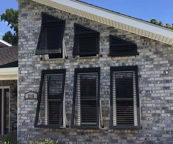 Economy Bahama shutter systems from C & Z Shutters feature roll-formed louvers that are for decorative purposes. These cost-effective shutters do not have the TDI classification for storm protection like our other hurricane shutters. C & Z Shutters