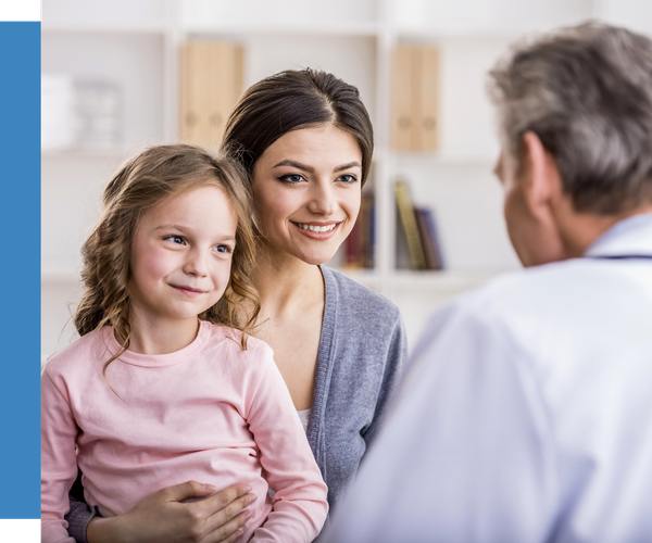 mother and doctor talking to technician